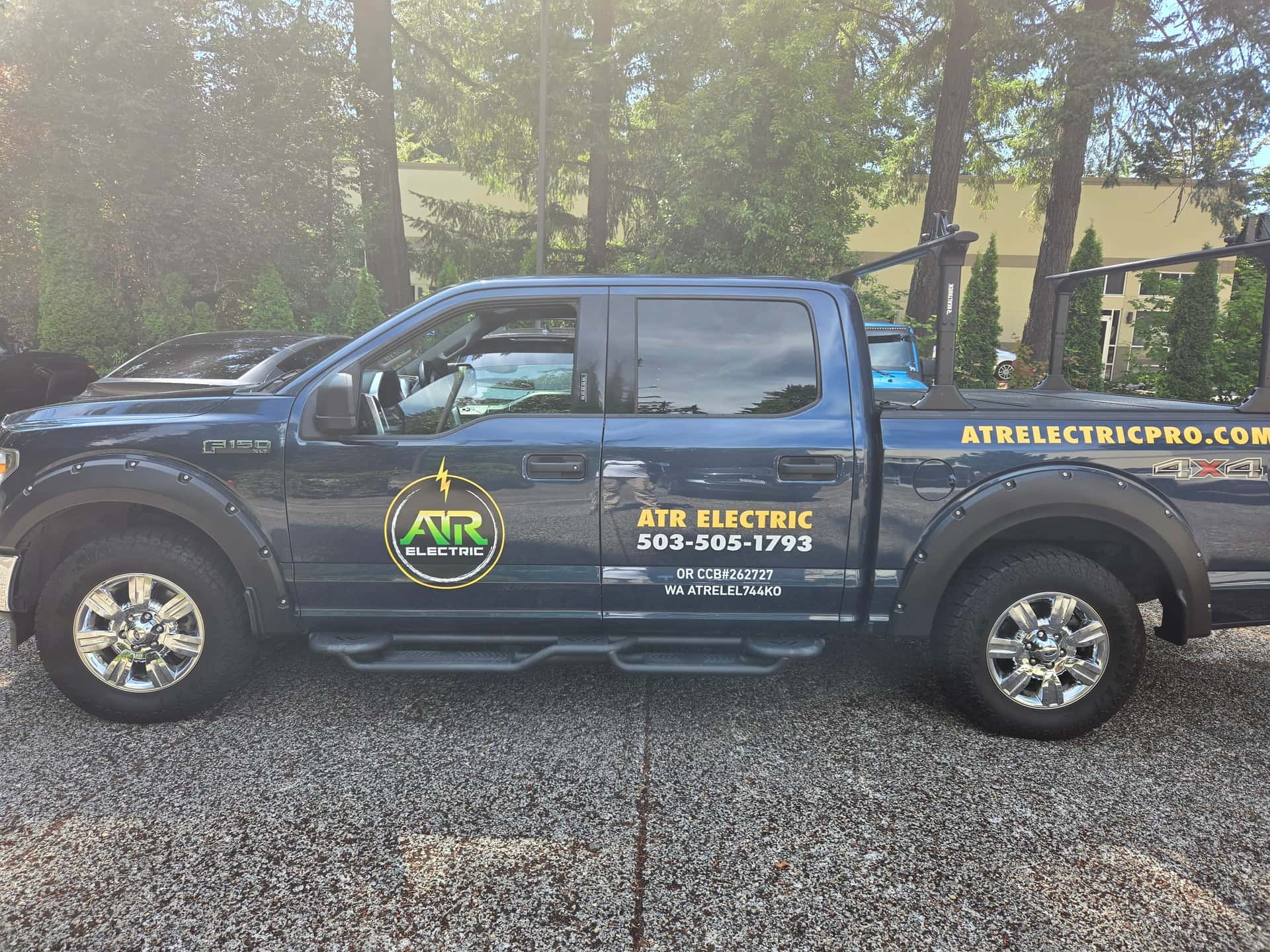 The ATR Electric truck, lettered with the company logo, phone number and the Oregon CCB and Washington licence numbers