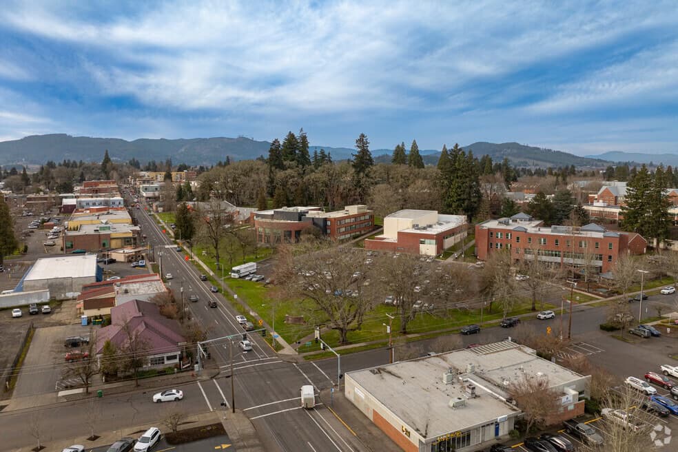 Aerial view of downtown Forest Grove, Oregon, with the Coast Range foothills behind the town