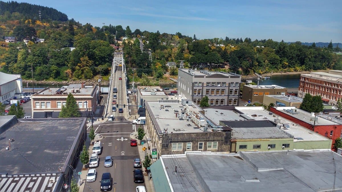 Aerial view down Main Street in downtown Oregon City, Oregon, toward the Oregon City Bridge