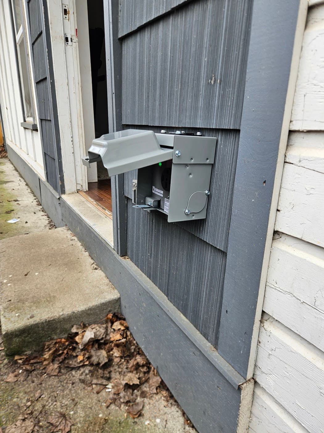 Weatherproof outdoor disconnect and junction box for an exterior EV charger