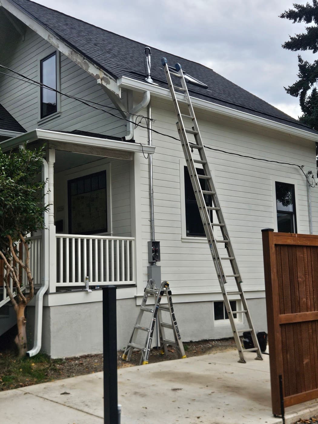 Exterior service riser and meter base on a house during an electrical service upgrade