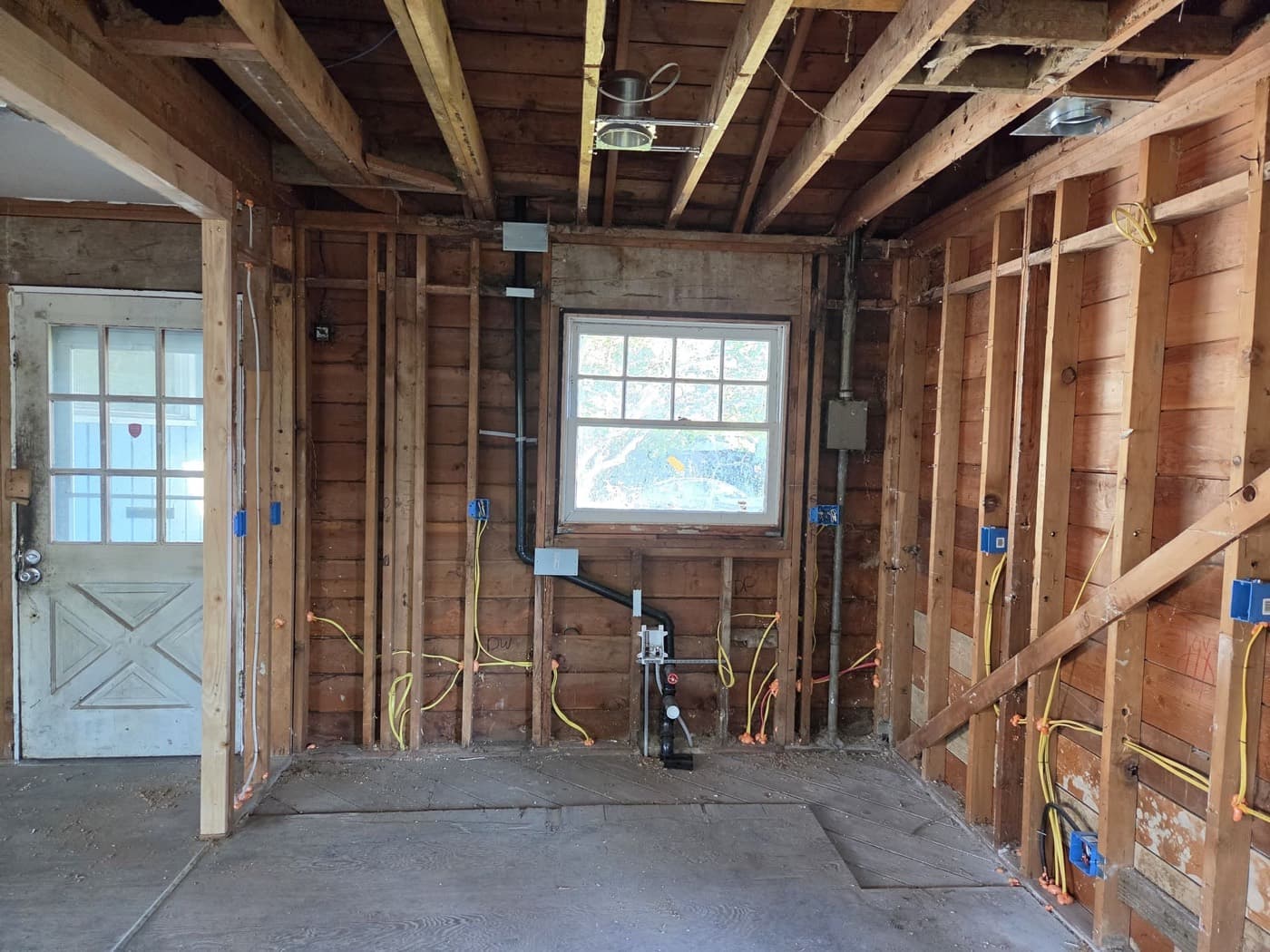 Kitchen stripped back to the studs during a whole room rewire