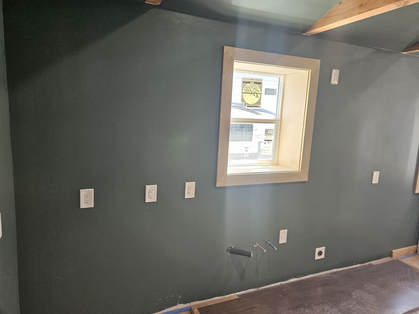 New construction trim out with switches and outlets set into a finished room